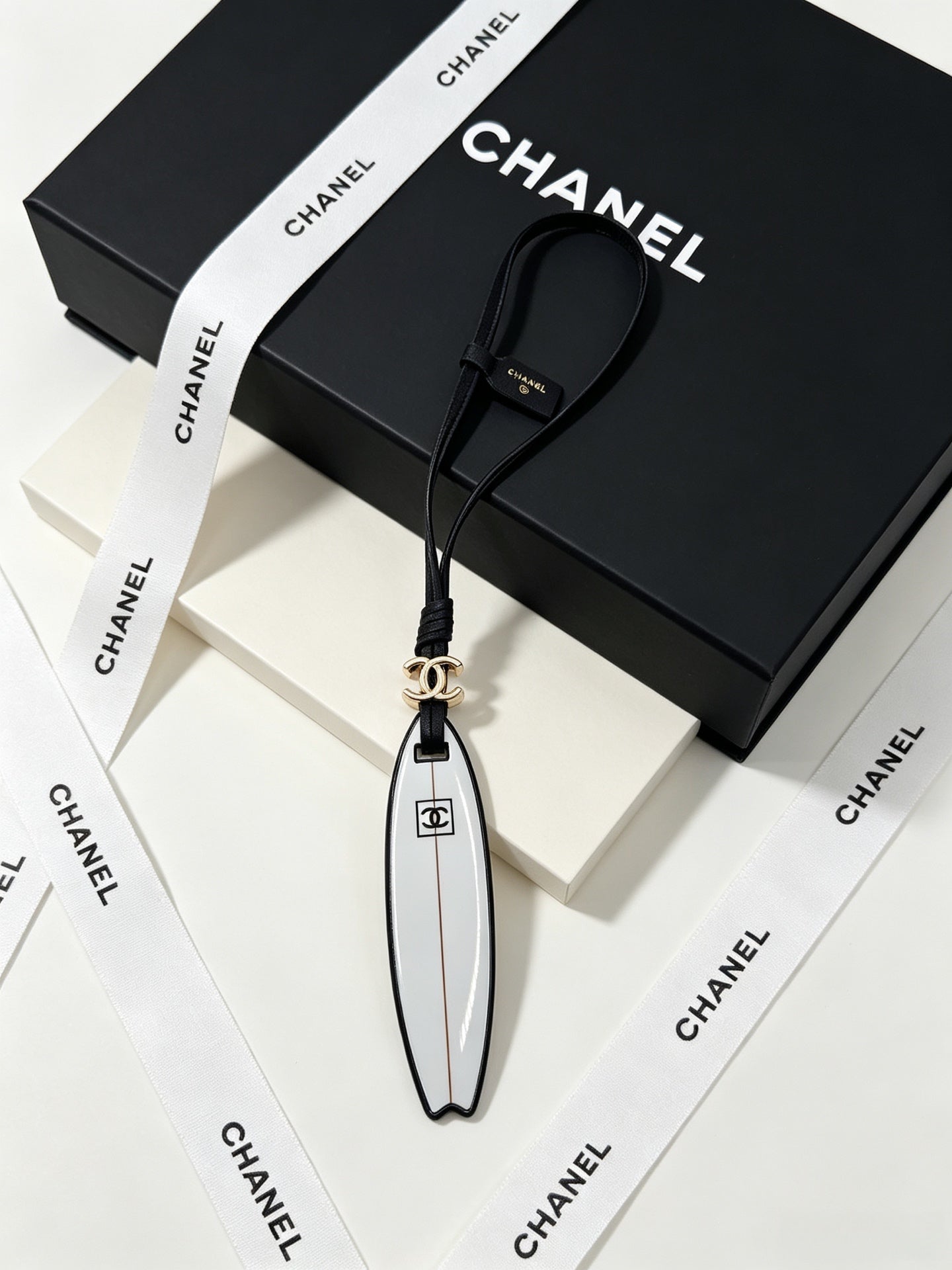 Chanel Surfboard-shaped Leather Cord Charm