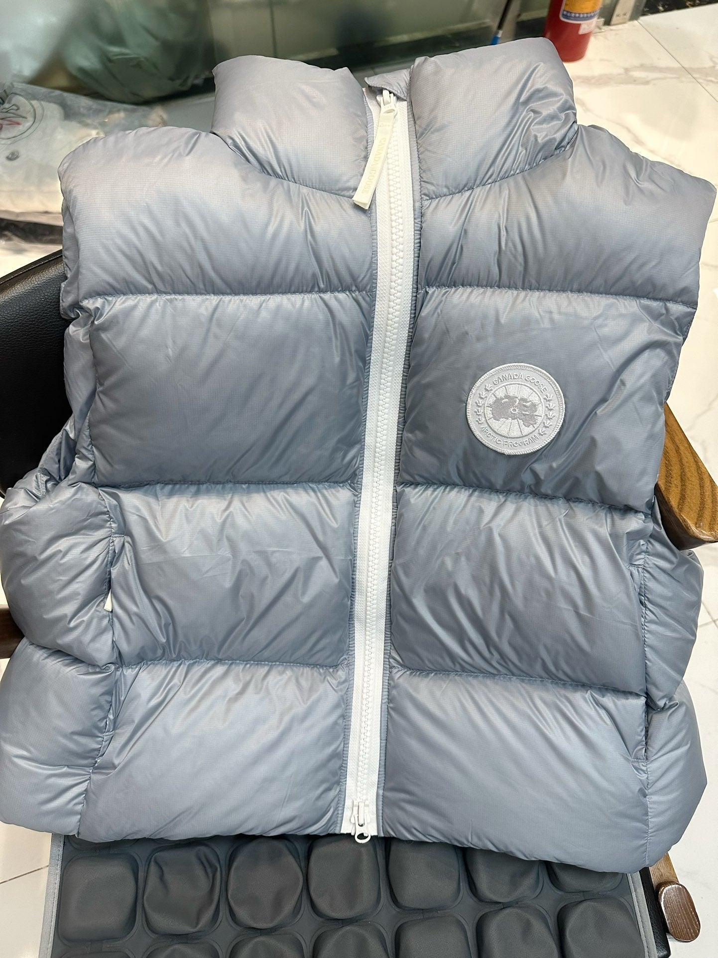 C. Goose Hooded Down Vest Polyester 0005